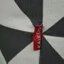 Close up of the Marrakesh Cube Grey-Ethnic Cube Logo