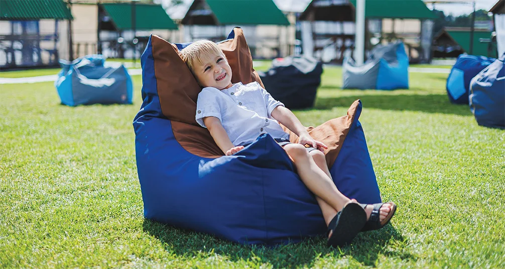 Sitting on outdoor beanbag in the sun