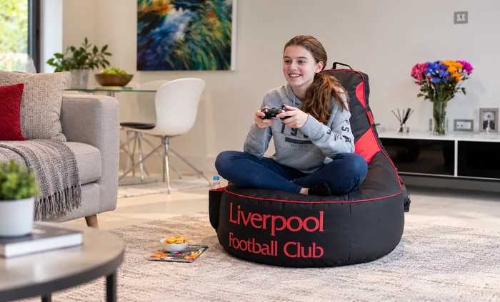 Liverpool football club bean bag chair in a living room